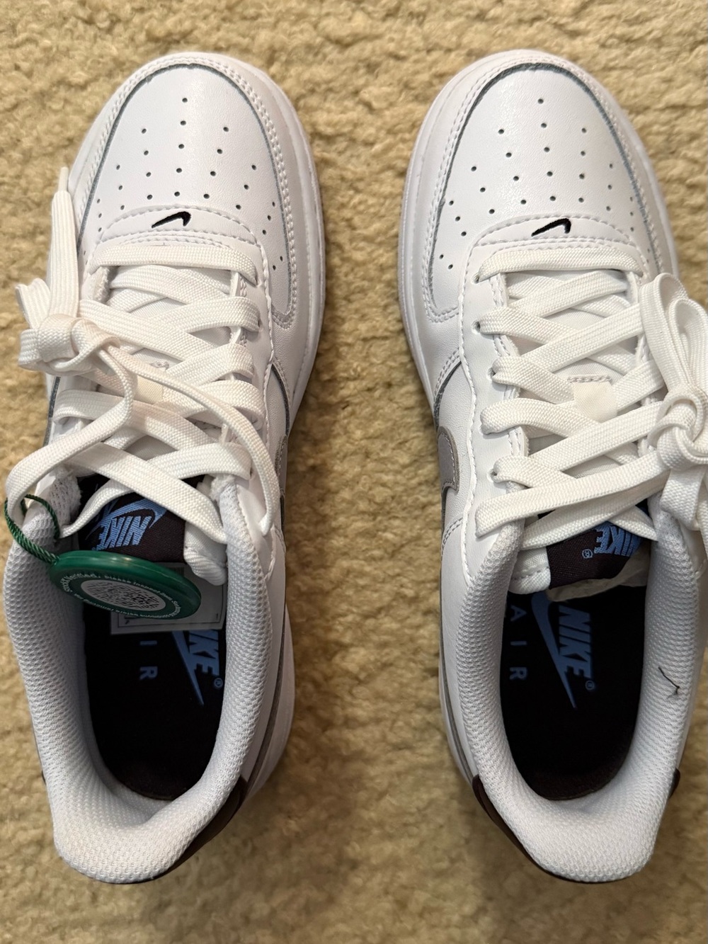 NIKE AIR FORCE 1  $80
White Low-Top Sneakers with Gray swoosh
Youth size 4 1/2